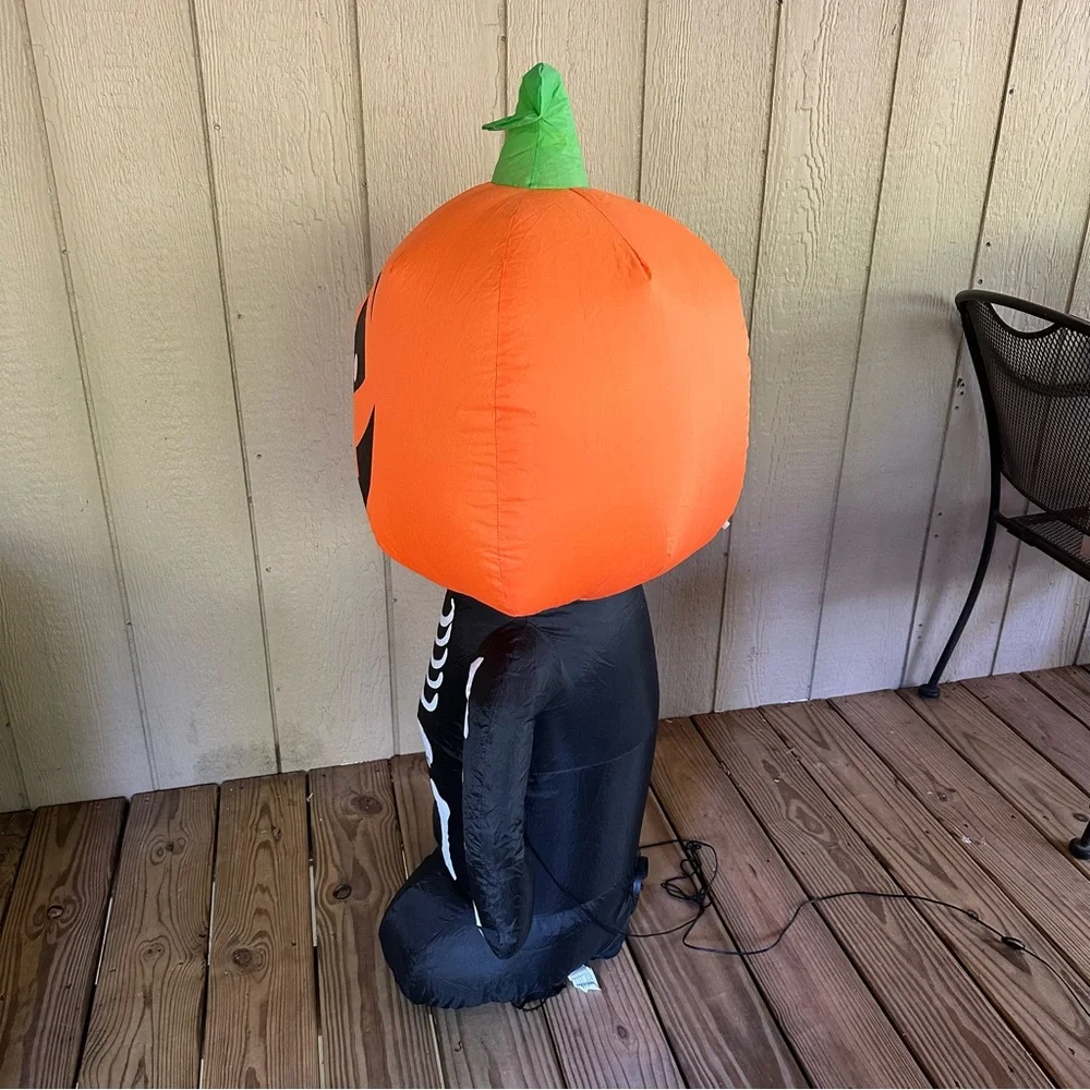 Home Accents Holiday 3.5 ft. Pre-lit Inflatable Happy Pumpkin Boy Skeleton LED